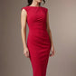 Woman wearing a red dress against a brown background (Cerise Red)