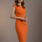 Woman wearing an orange dress against a neutral background (Burnt Terracotta)