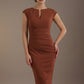 Woman wearing a brown dress against a plain background (Terracotta Brown)