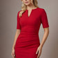 Woman wearing a red dress against a neutral background (Cerise Red)