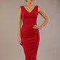 Woman wearing a red dress against a plain background (Cerise Red)