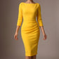 Woman wearing a yellow dress against a neutral background - Seed Agatha Sleeved Pencil Dress-(Daffodil Yellow)