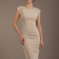 Woman wearing a diva catwalk green dress against a brown background - Seed Anna Sleeveless Pencil Skirt Dress (Sandy Cream)
