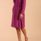 model wearing diva catwalk teal coat with long sleeves and a belt in Orchid Purple side