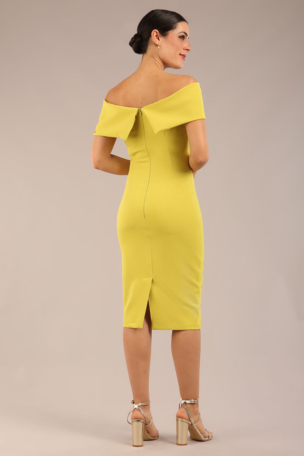 model is wearing diva catwalk mariposa pencil dress with Detailed Bardot neckline with fold-over detail and pleated at waist area in Citrus green