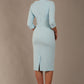 model wearing diva catwalk ubrique pencil dress with a keyhole detail and sleeves in sky blue colour back (Sky Blue)