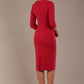 model is wearing the Diva Catwalk Ubrique pencil dress with Long sleeves and keyhole detail in Raspberry Pink fabric colour (Raspberry Pink)