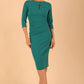 model wearing diva catwalk ubrique pencil dress with a keyhole detail and sleeves in parasailing green (Parasailing Green)