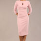 model wearing diva catwalk ubrique pencil dress with a keyhole detail and sleeves in crystal pink (Crystal Pink)