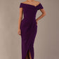 model wearing diva catwalk vegas calf length passion purple midaxi dress with wide bardot neckline and open shoulders with a large opening at the front of the skirt with pleating coming down long skirt front (Passion Purple)