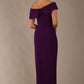 model wearing diva catwalk vegas calf length passion purple midaxi dress with wide bardot neckline and open shoulders with a large opening at the front of the skirt with pleating coming down long skirt front (Passion Purple)
