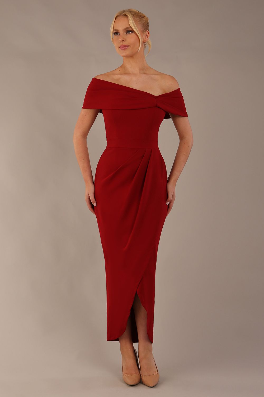 model wearing diva catwalk vegas calf length rosewood red midaxi dress with wide bardot neckline and open shoulders with a large opening at the front of the skirt with pleating coming down long skirt front (Rosewood Red)