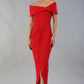 model wearing diva catwalk vegas calf length midaxi dress with wide bardot neckline and open shoulders with a large opening at the front of the skirt with pleating coming down long skirt front in scarlet red (Scarlet Red)