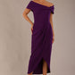 brunette model wearing diva catwalk vegas calf length passion purple midaxi dress with wide bardot neckline and open shoulders with a large opening at the front of the skirt with pleating coming down long skirt front (Passion Purple)