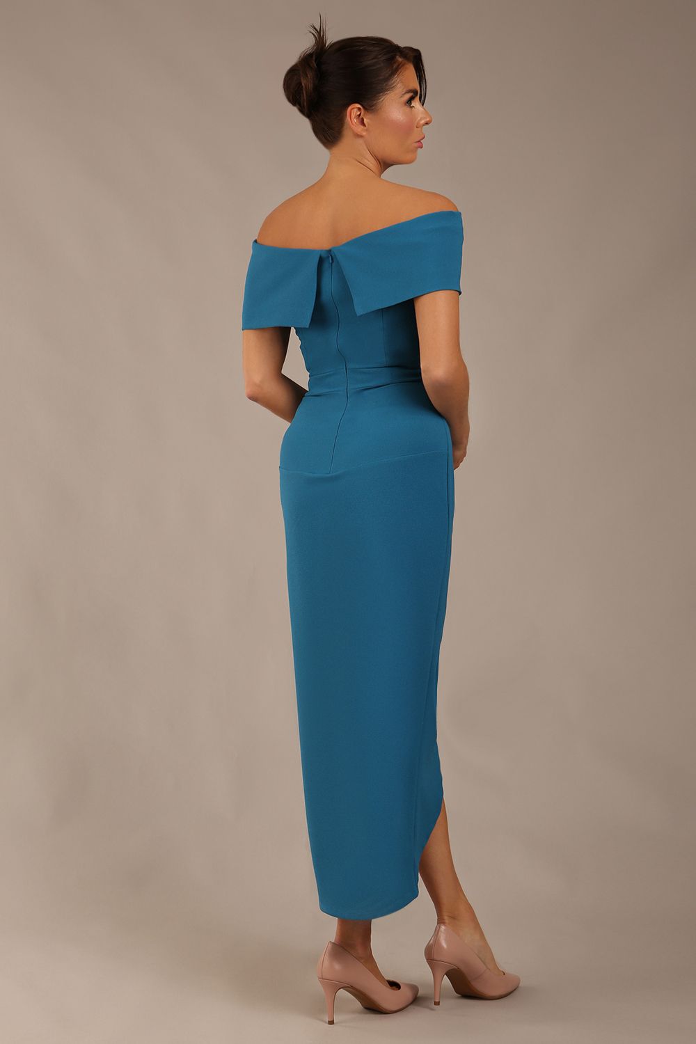 brunette model wearing diva catwalk vegas calf length Teal midaxi dress with wide bardot neckline and open shoulders with a large opening at the front of the skirt with pleating coming down long skirt back (Tropical Teal)