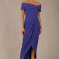 model wearing diva catwalk vegas calf length spectrum indigo midaxi dress with wide bardot neckline and open shoulders with a large opening at the front of the skirt with pleating coming down long skirt front (Spectrum Indigo)