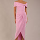 brunette model wearing diva catwalk vegas calf length dawn pink midaxi dress with wide bardot neckline and open shoulders with a large opening at the front of the skirt with pleating coming down long skirt front (Dawn Pink)