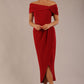 brunette model wearing diva catwalk vegas calf length rosewood red midaxi dress with wide bardot neckline and open shoulders with a large opening at the front of the skirt with pleating coming down long skirt front (Rosewood Red)