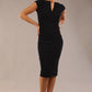 brunette model wearing diva catwalk lydia sleeveless pencil flattering fitted plain dress with split neckline and pleating across the body Midnight Blue front (Midnight Blue)