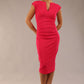 brunette model wearing diva catwalk lydia sleeveless pencil flattering fitted plain dress with split neckline and pleating across the body virtual pink (Virtual Pink)