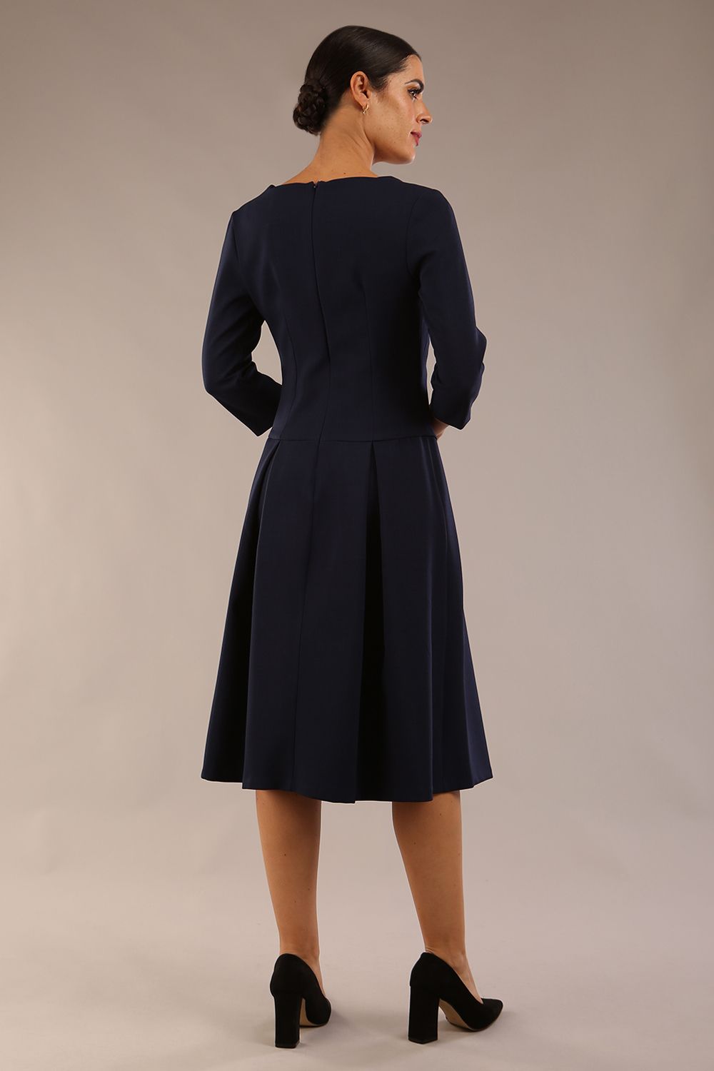 model is wearing a diva catwalk Cordelia Square Neck Pleated Midi A-line Dress with 3/4 sleeve in navy blue colour back  (Navy Blue)