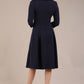 model is wearing a diva catwalk Cordelia Square Neck Pleated Midi A-line Dress with 3/4 sleeve in navy blue colour back (Navy Blue)