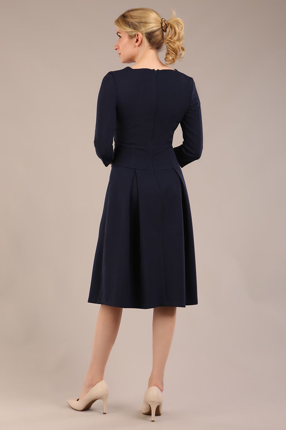 model is wearing a diva catwalk Cordelia Square Neck Pleated Midi A-line Dress with 3/4 sleeve in navy blue colour back (Navy Blue)