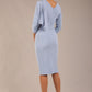 brunette model is wearing a diva catwalk Frieth Gathered Shoulder Dress 3/4 sleeves knee length with shoulder detail in powder blue colour back image (Powder Blue)