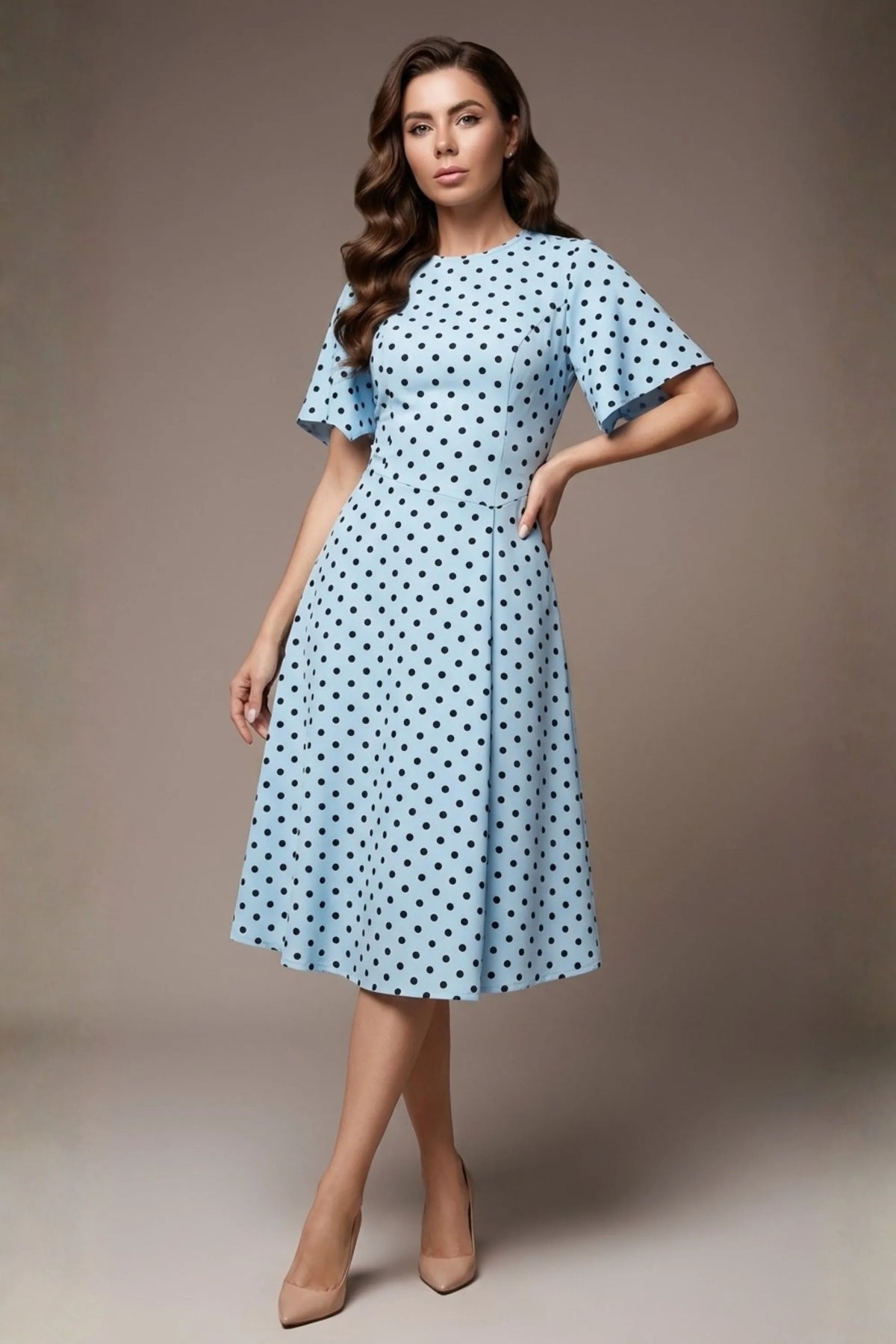 brunette model is wearing a diva catwalk Anastasia Polka Dot Bell Sleeves & A-Line Skirt Midi Dress a-line dress in sky blue polka dot front image (Sky Blue Polka Dot)