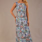 blonde model is wearing a 7000 diva catwalk Glyndebourne Sleeveless Square Neck Maxi Dress in Water Garden print with pockets front