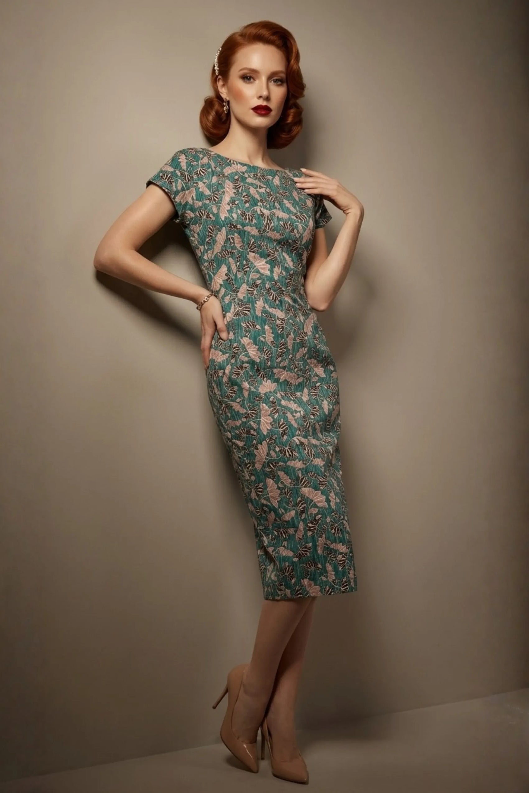 Woman wearing a diva catwalk Magritte Vintage Floral Cotton Pencil Dress, floral dress against a plain background (Vintage Floral Print)