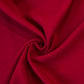 Close-up of red fabric with a swirl pattern